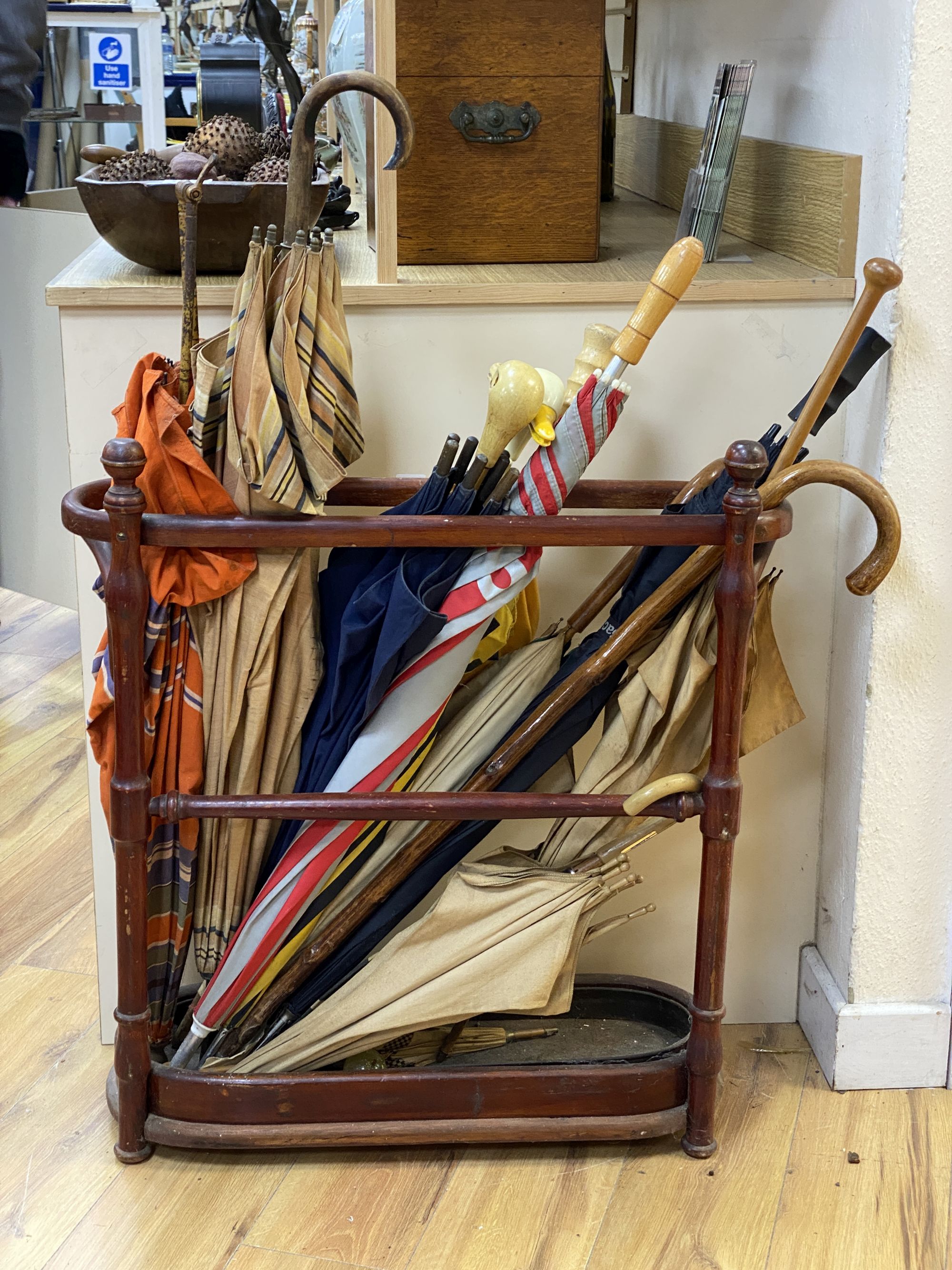 A bentwood stick stand and sticks